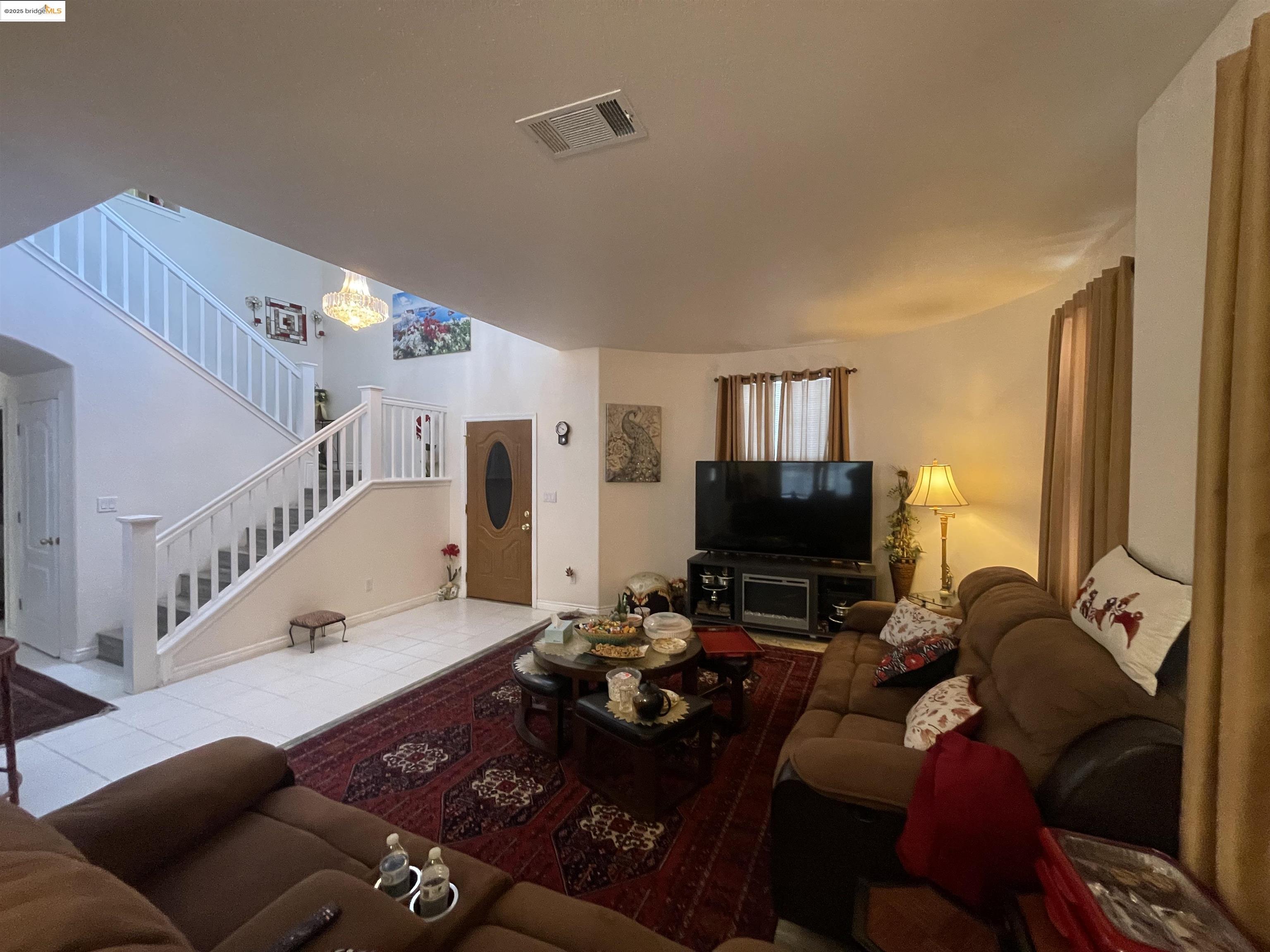 1928 Badger Pass Way Antioch, CA 94531 - Photo 5 of 50 a living room with furniture and a flat screen tv