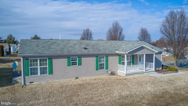 a house view with a backyard space