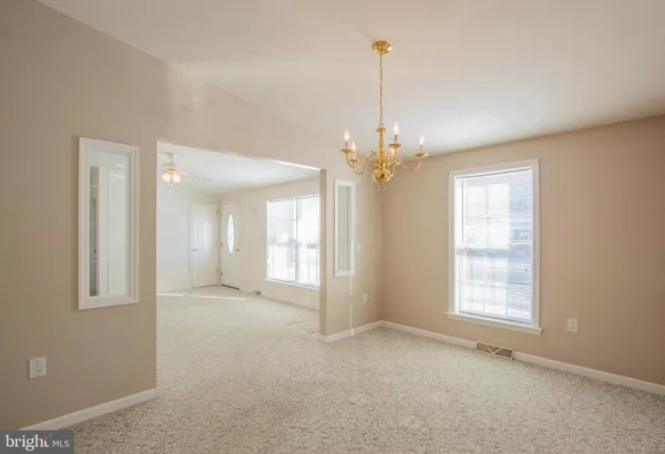 a view of an empty room with window