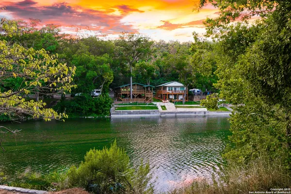 a view of a swimming pool with a garden
