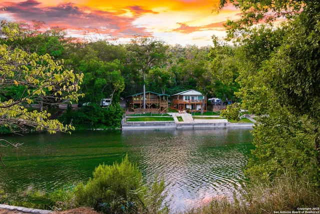 a view of a swimming pool with a garden