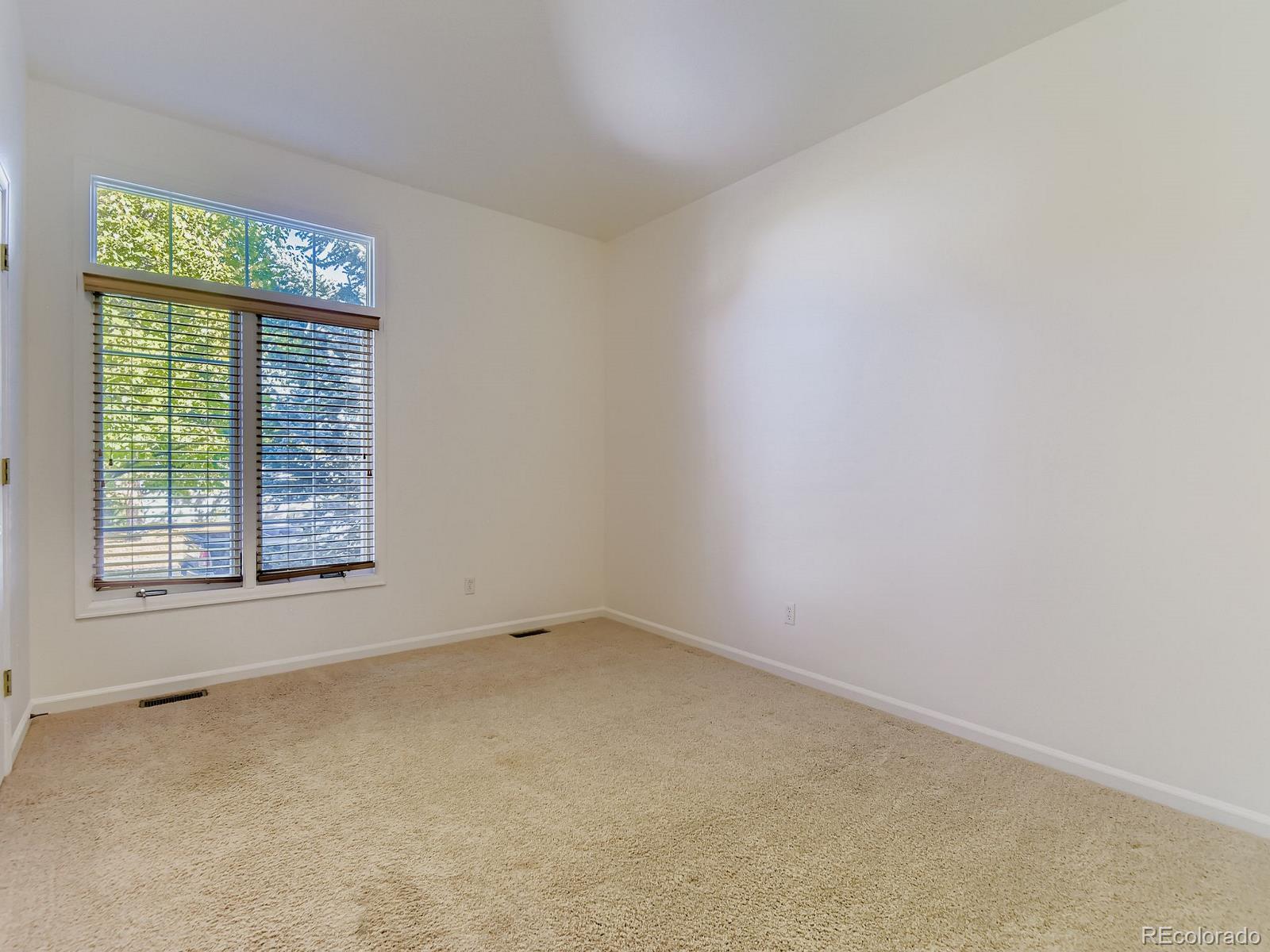 5418 Shetland Court Highlands Ranch, CO 80130 - Photo 14 of 23 an empty room with a window