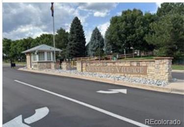 5418 Shetland Court Highlands Ranch, CO 80130 - Photo 17 of 23 a view of a house with a swimming pool