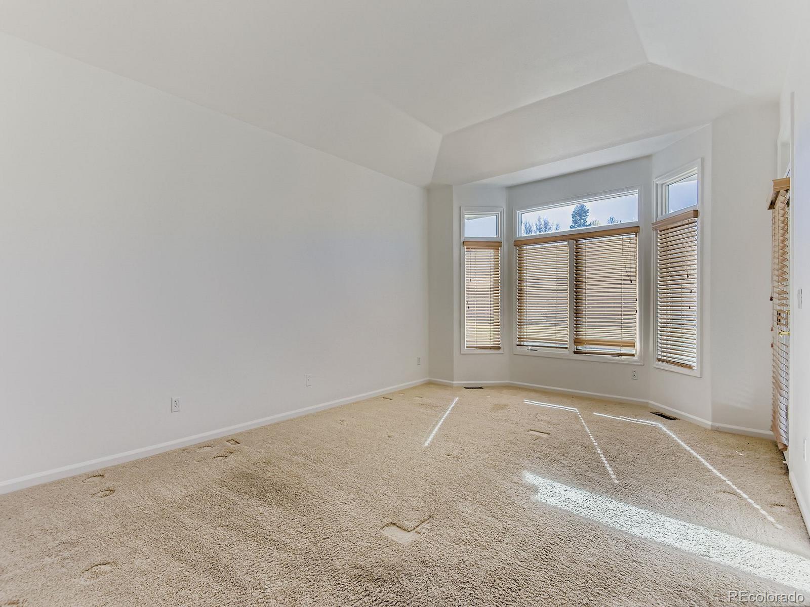 5418 Shetland Court Highlands Ranch, CO 80130 - Photo 10 of 23 an empty room with a window