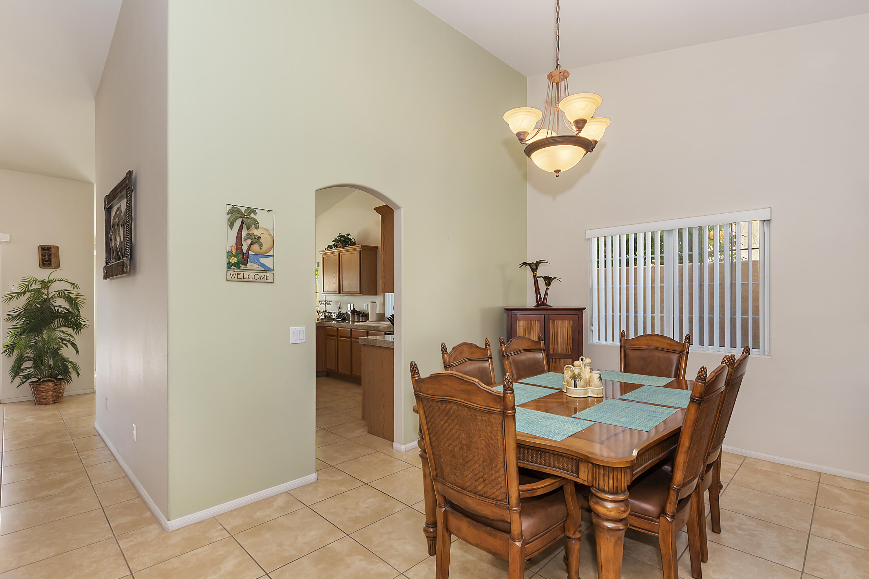 68945 Minerva Road Cathedral City, CA 92234 - Photo 11 of 42 a dining room with furniture and window