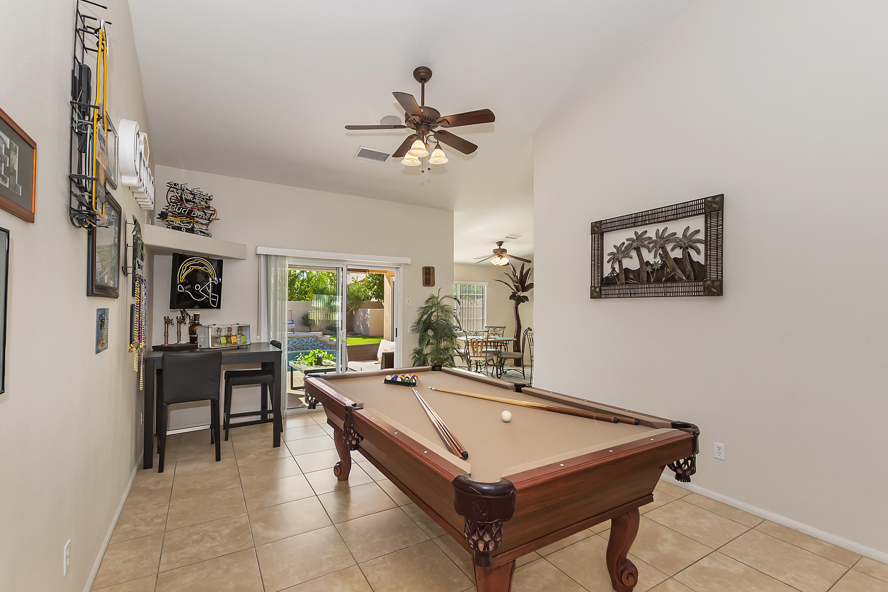68945 Minerva Road Cathedral City, CA 92234 - Photo 14 of 42 a room with pool table and windows