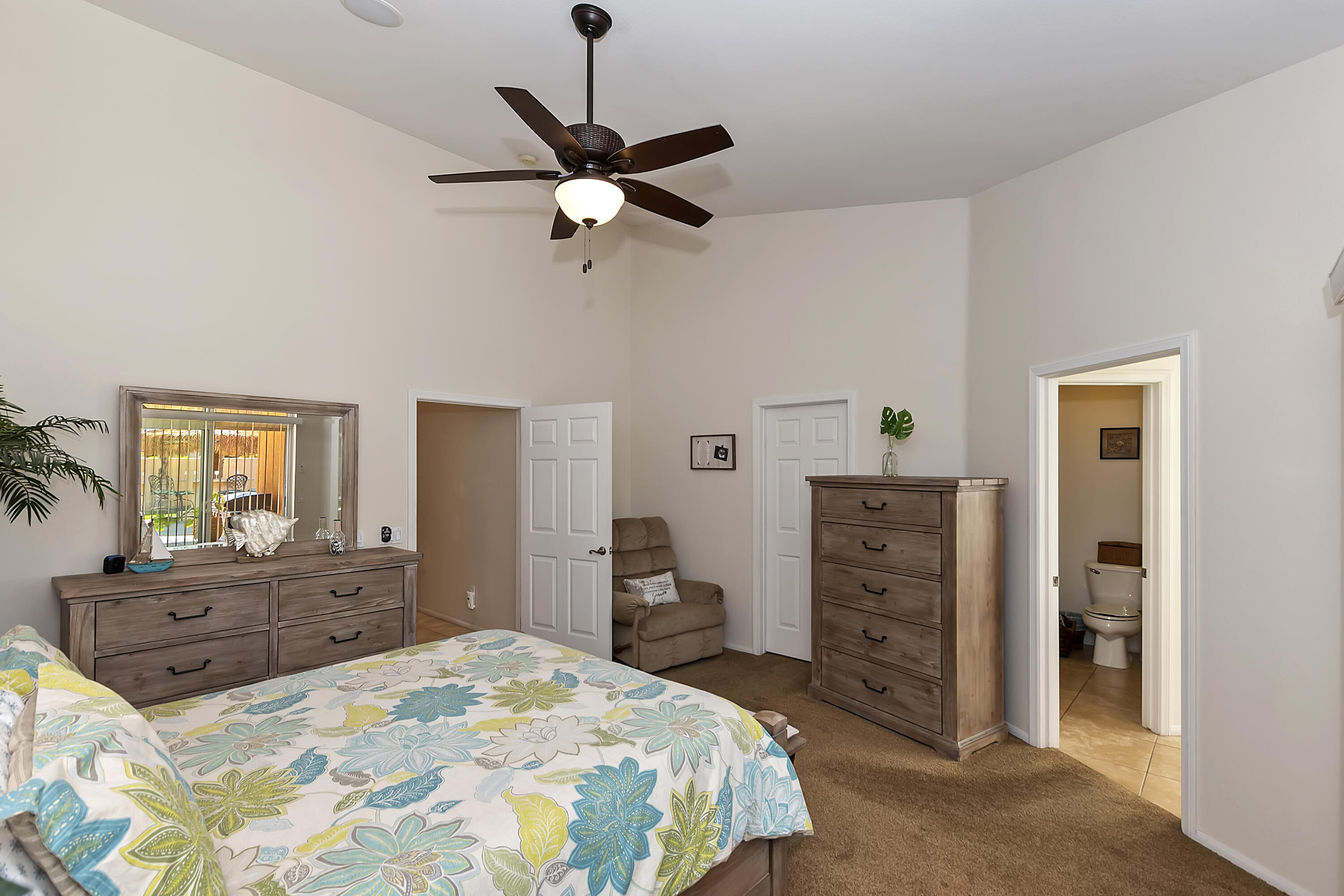 68945 Minerva Road Cathedral City, CA 92234 - Photo 29 of 42 a bedroom with a bed and furniture