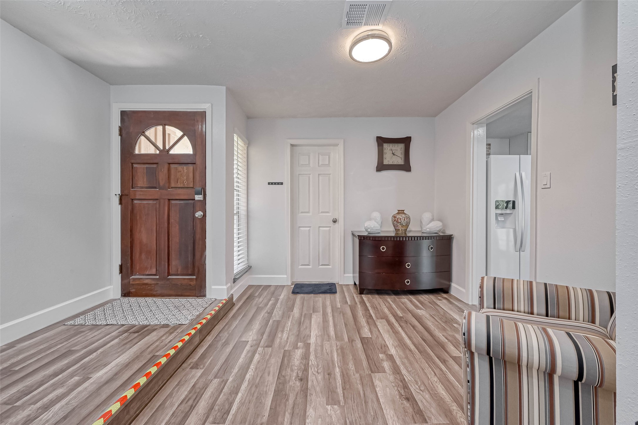 11618 Corona Lane Houston, TX 77072 - Photo 33 of 50 a bedroom with a bed and a view of wooden floor