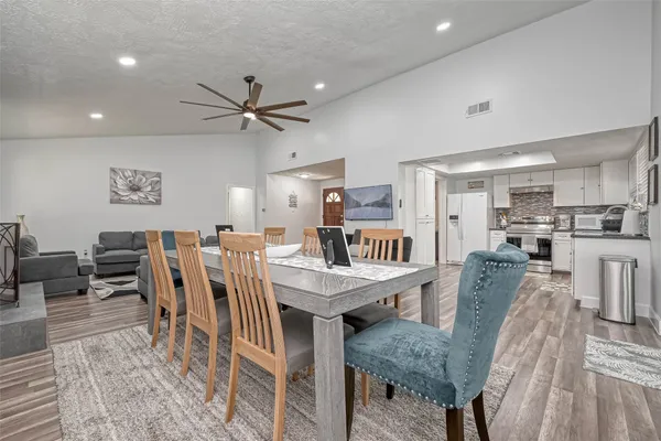 a view of a dining room with furniture