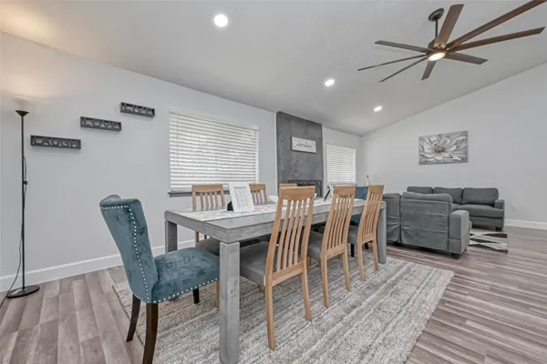 a view of a dining room with furniture