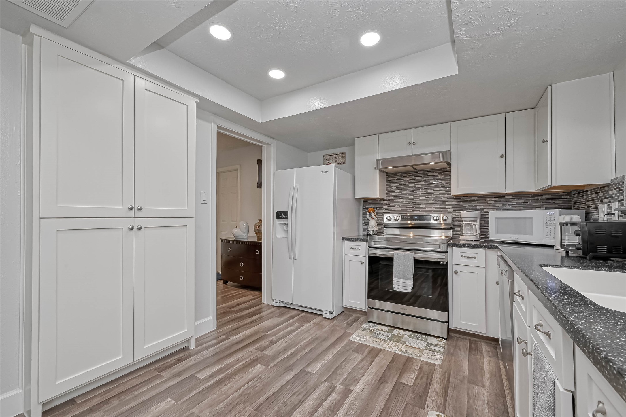 11618 Corona Lane Houston, TX 77072 - Photo 45 of 50 a kitchen with stainless steel appliances granite countertop a stove and a refrigerator