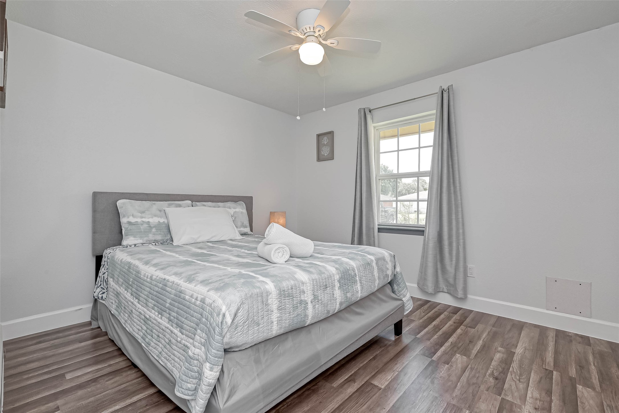 11618 Corona Lane Houston, TX 77072 - Photo 49 of 50 a bedroom with a bed and window