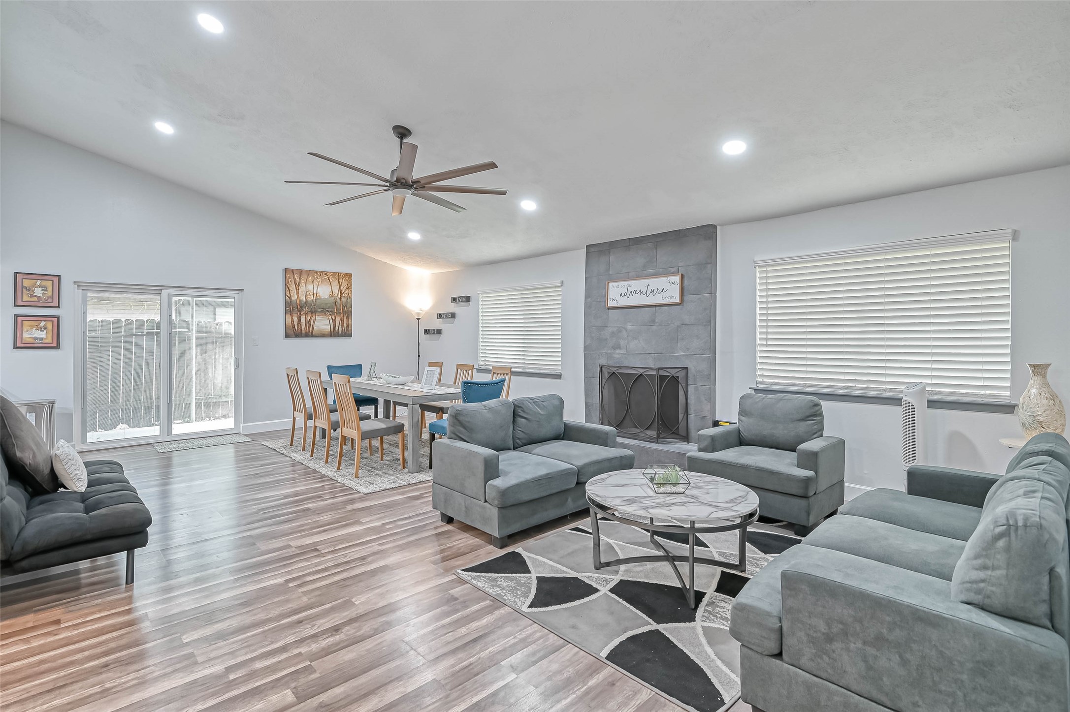11618 Corona Lane Houston, TX 77072 - Photo 5 of 50 a living room with furniture a fireplace and a table