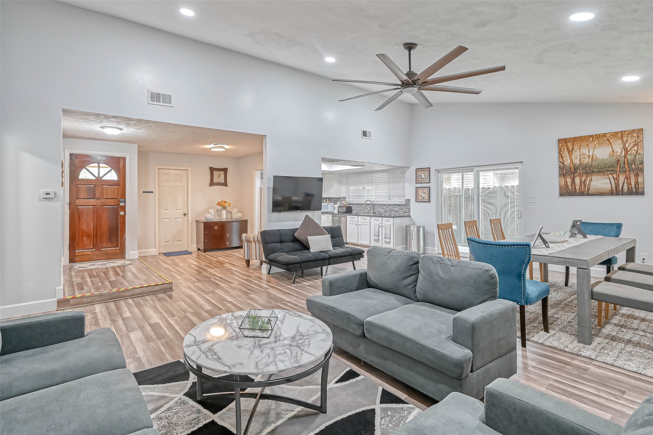 11618 Corona Lane Houston, TX 77072 - Photo 8 of 50 a living room with furniture and a view of kitchen