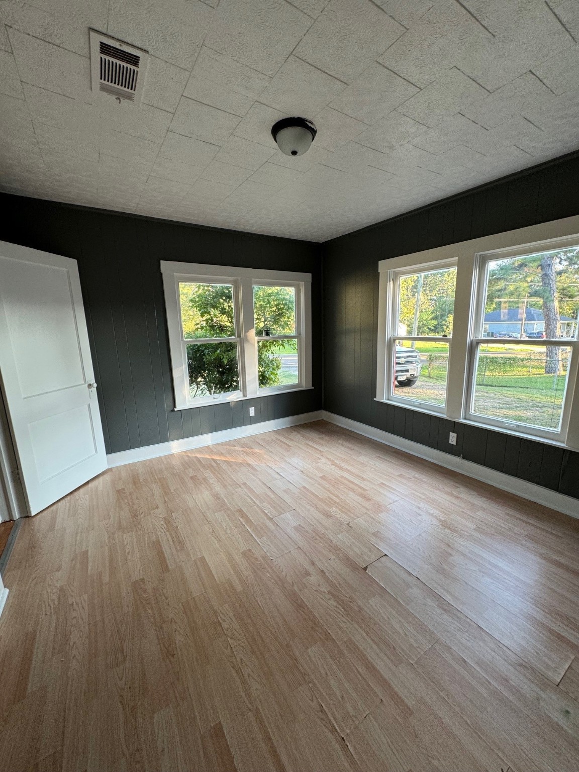 1809 Old Israel Road Livingston, TX 77351 - Photo 10 of 15 a view of an empty room with wooden floor and a window