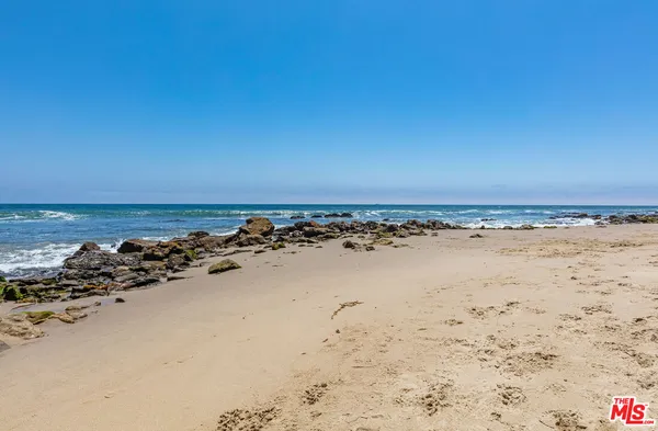 a view of ocean with beach