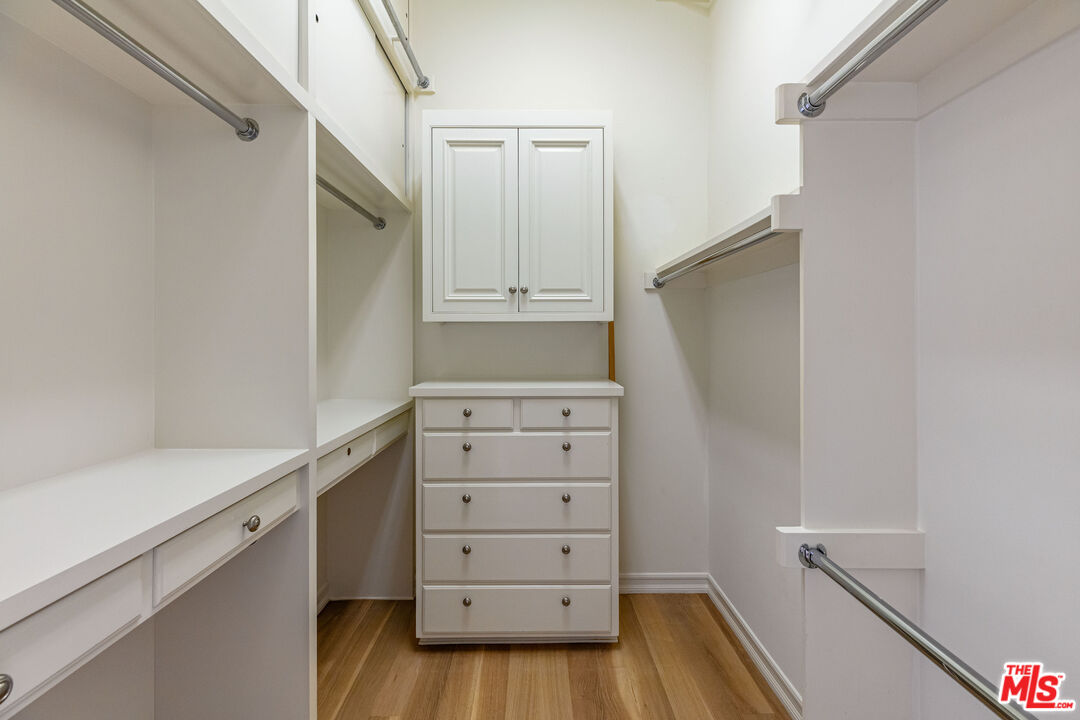 24314 Malibu Road Malibu, CA 90265 - Photo 28 of 41 a view of walk in closet with empty racks