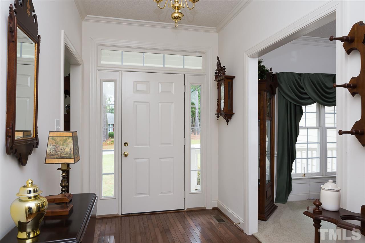 4412 Hopson Drive Raleigh, NC 27604 - Photo 3 of 25 a view of walk in closet with clothes and shoes