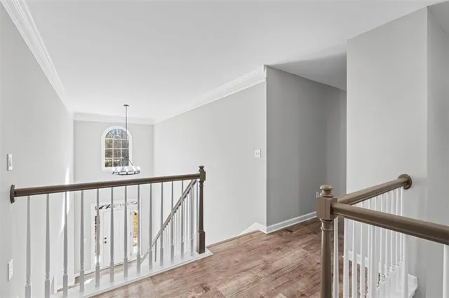 a bathroom with a double vanity sink mirror and a bathtub