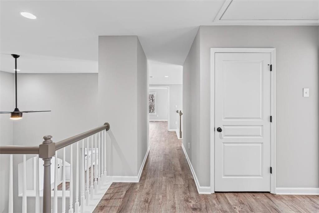 1038 Middlebrooke Drive Canton, GA 30115 - Photo 26 of 76 a view of a hallway with wooden floor and entryway