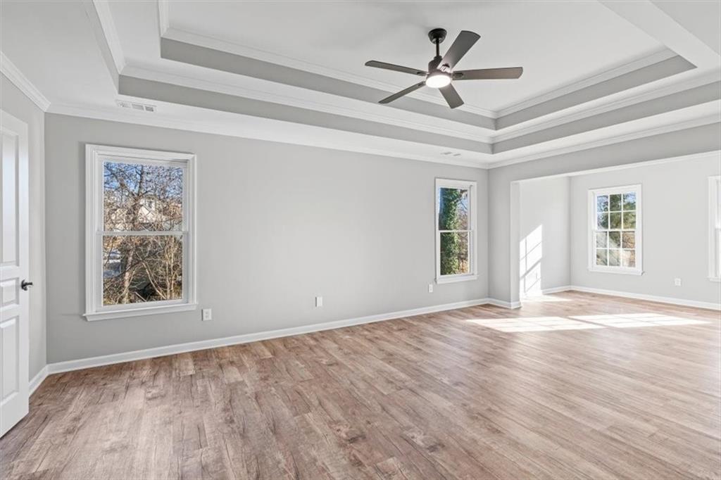 1038 Middlebrooke Drive Canton, GA 30115 - Photo 27 of 76 a view of an empty room with a window and wooden floor