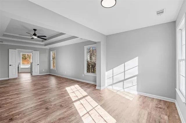 a bathroom with a toilet a sink and a mirror