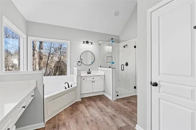 a view of a chandelier fan in a room