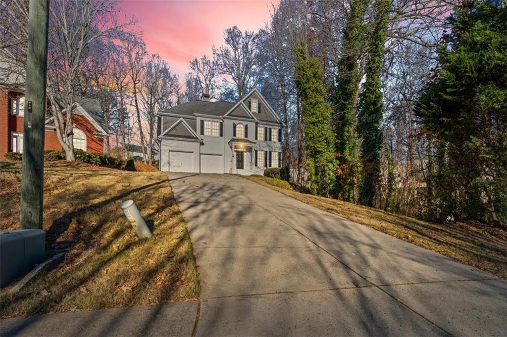 1038 Middlebrooke Drive Canton, GA 30115 - Photo 4 of 76 a view of a house with a large trees