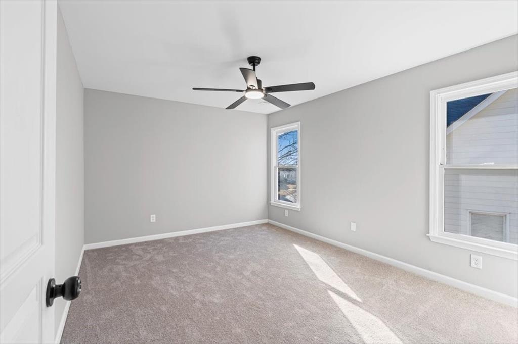 1038 Middlebrooke Drive Canton, GA 30115 - Photo 47 of 76 a view of a chandelier fan in a room