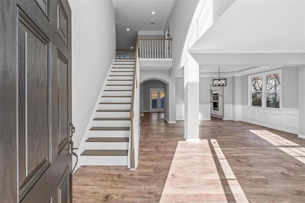 1038 Middlebrooke Drive Canton, GA 30115 - Photo 6 of 76 a view of entryway and hall with wooden floor