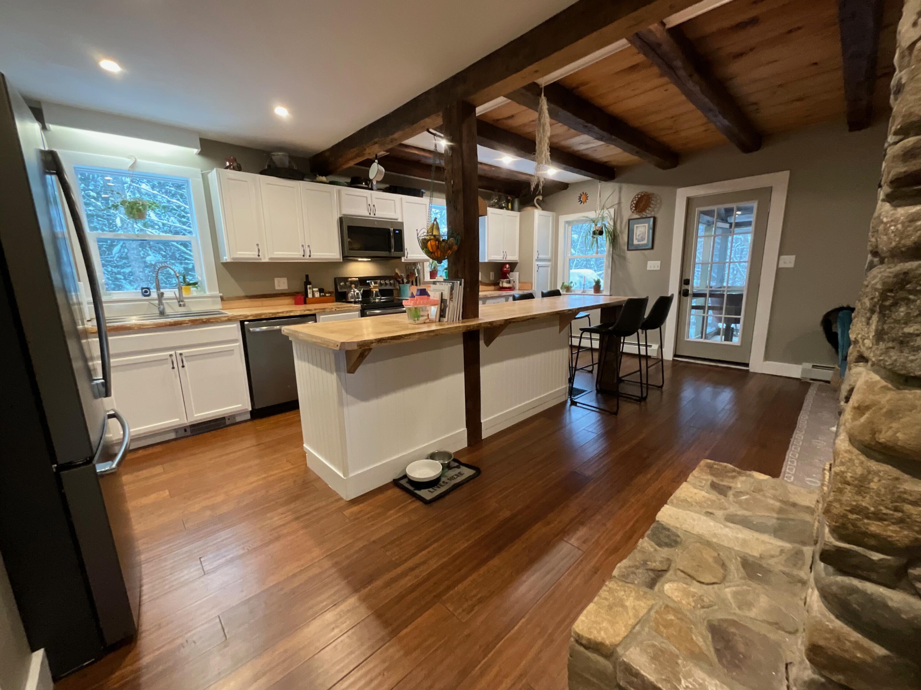 41 Laren Road Jefferson, ME 04348 - Photo 23 of 53 View of kitchen from top of stairs