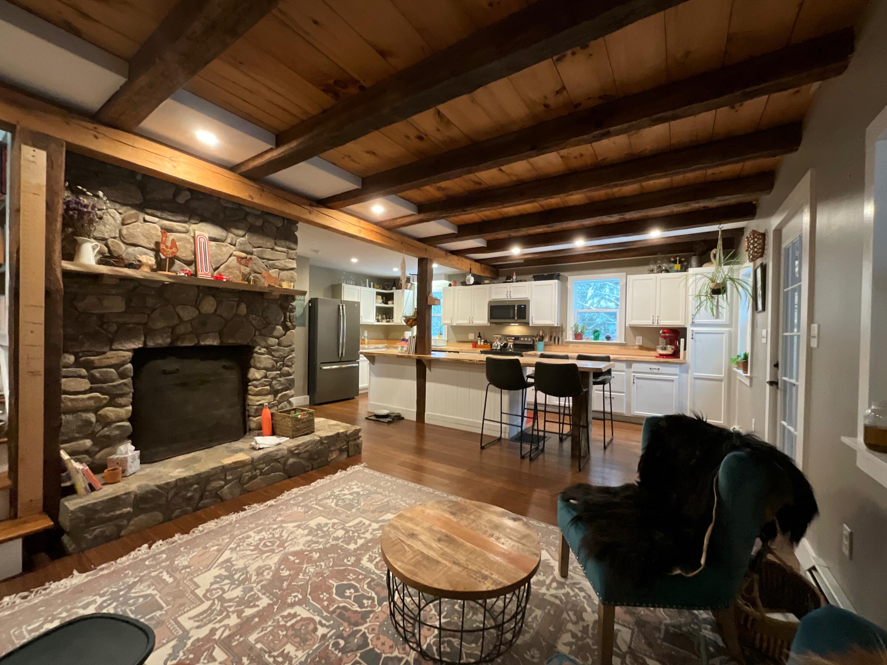 41 Laren Road Jefferson, ME 04348 - Photo 27 of 53 Sitting area view of Fireplace & Kitchen