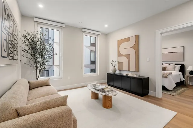 a living room with furniture or couch and a window