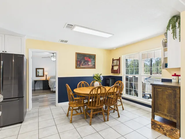 a kitchen with a refrigerator sink and stove