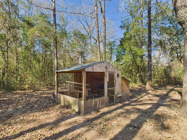 front view of a building with a garden