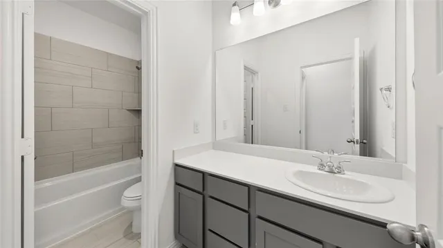a bathroom with a sink and a bathtub