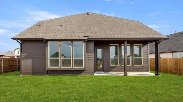 a house view with a garden space