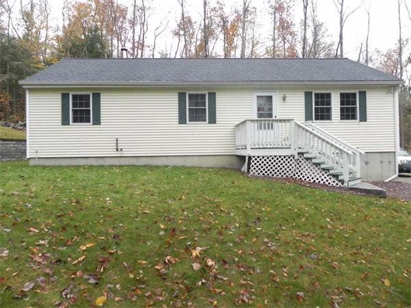 536 Cutler Road Barre, MA 01005 - Photo 1 of 24 a front view of a house with a garden
