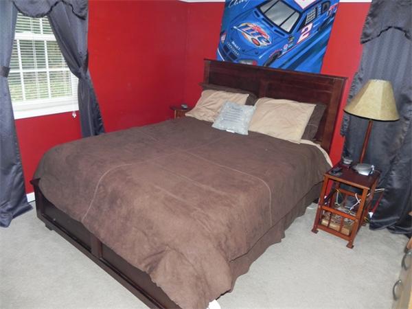 536 Cutler Road Barre, MA 01005 - Photo 16 of 24 a bed sitting in a bedroom next to a window