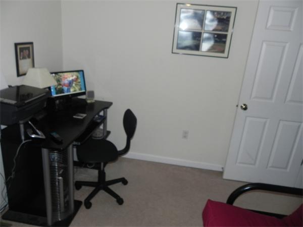 536 Cutler Road Barre, MA 01005 - Photo 18 of 24 a view of a workspace with furniture and a window