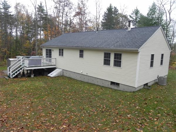 536 Cutler Road Barre, MA 01005 - Photo 23 of 24 a backyard of a house with table and chairs