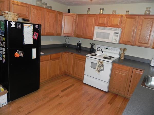 536 Cutler Road Barre, MA 01005 - Photo 3 of 24 a kitchen with stainless steel appliances granite countertop a refrigerator and a stove
