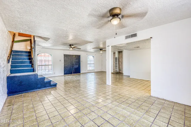 a house with trees in front of it