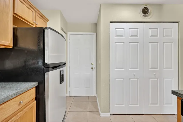 a view of a kitchen with a sink