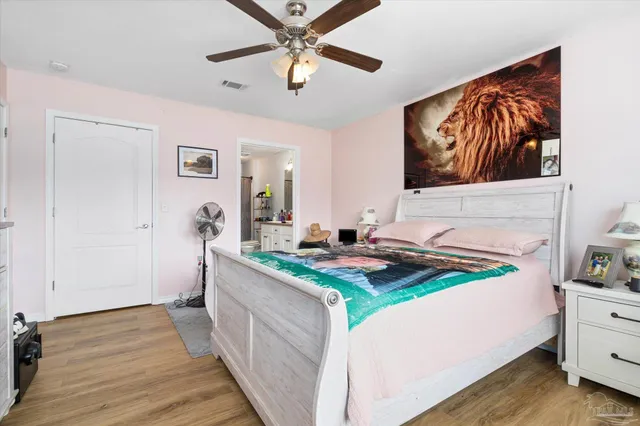 a kitchen that has a lot of cabinets in it