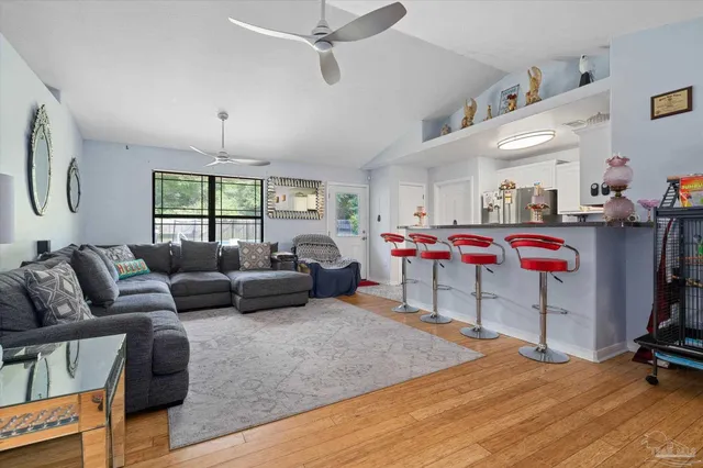 a bedroom with furniture and a chandelier