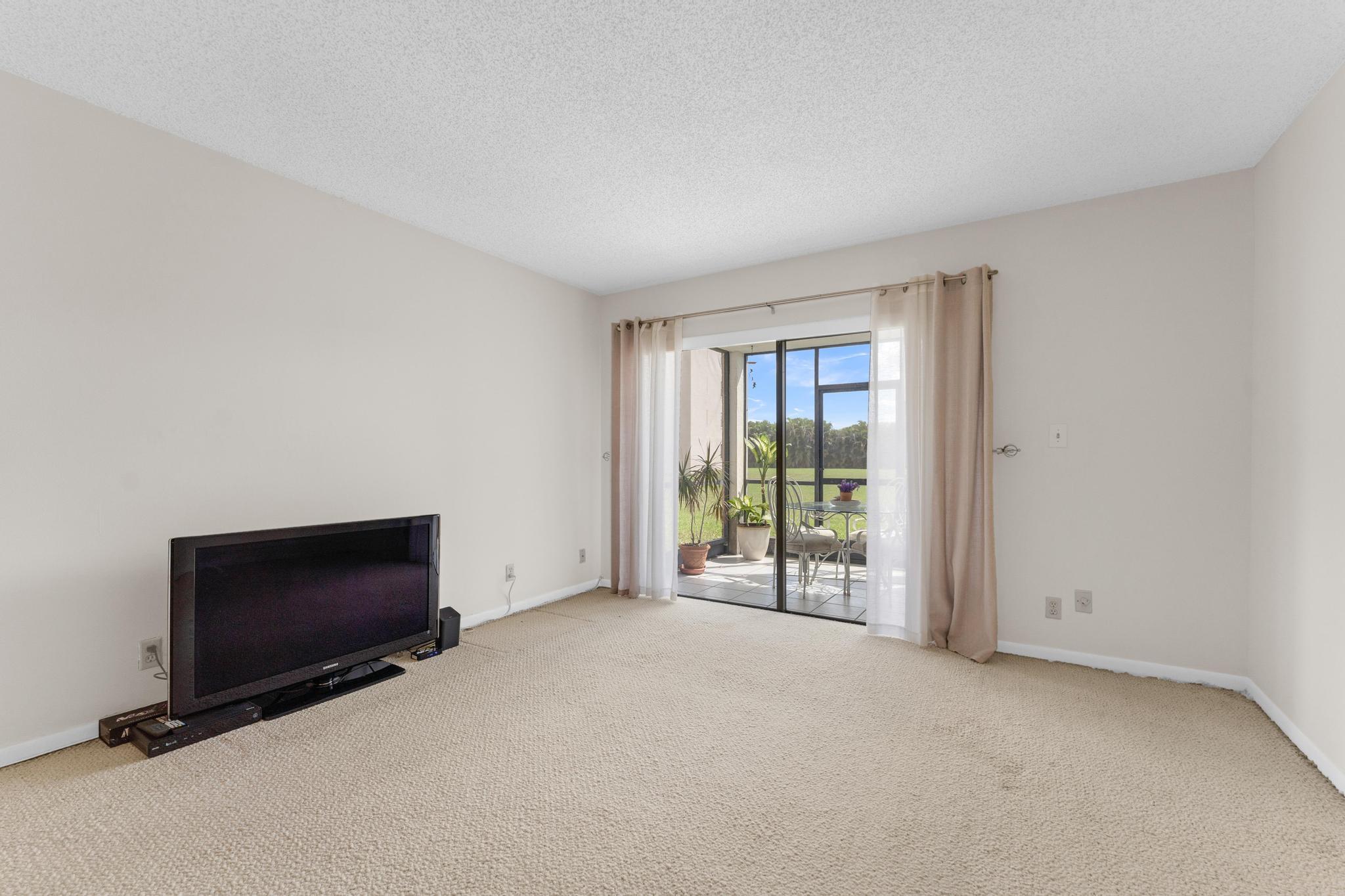9300 Southwest 8th Street, Unit 109 Boca Raton, FL 33428 - Photo 6 of 34 Living Room