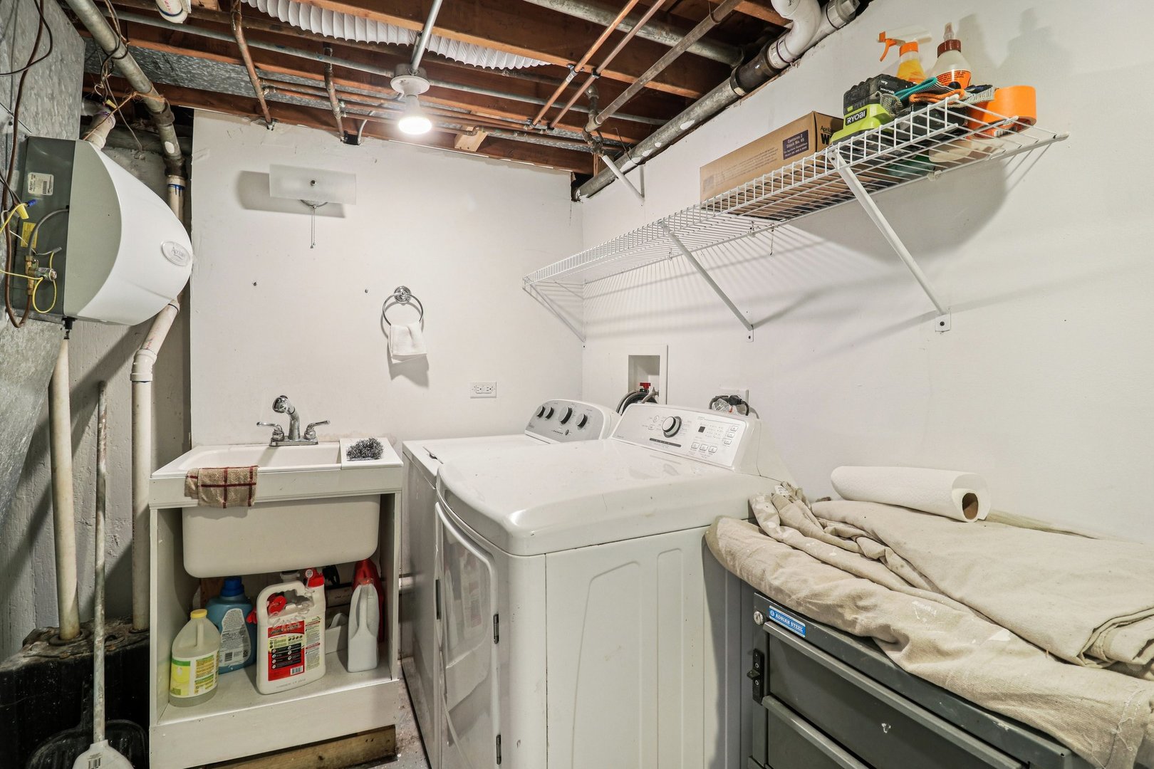 2931 Greenleaf Avenue Wilmette, IL 60091 - Photo 35 of 44 a utility room with dryer and washer