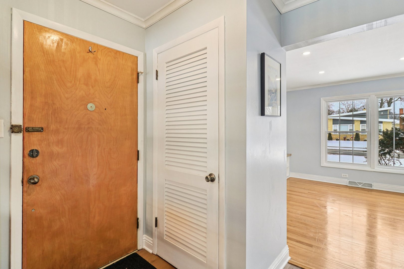 2931 Greenleaf Avenue Wilmette, IL 60091 - Photo 5 of 44 a view of a bathroom with wooden floor and a window