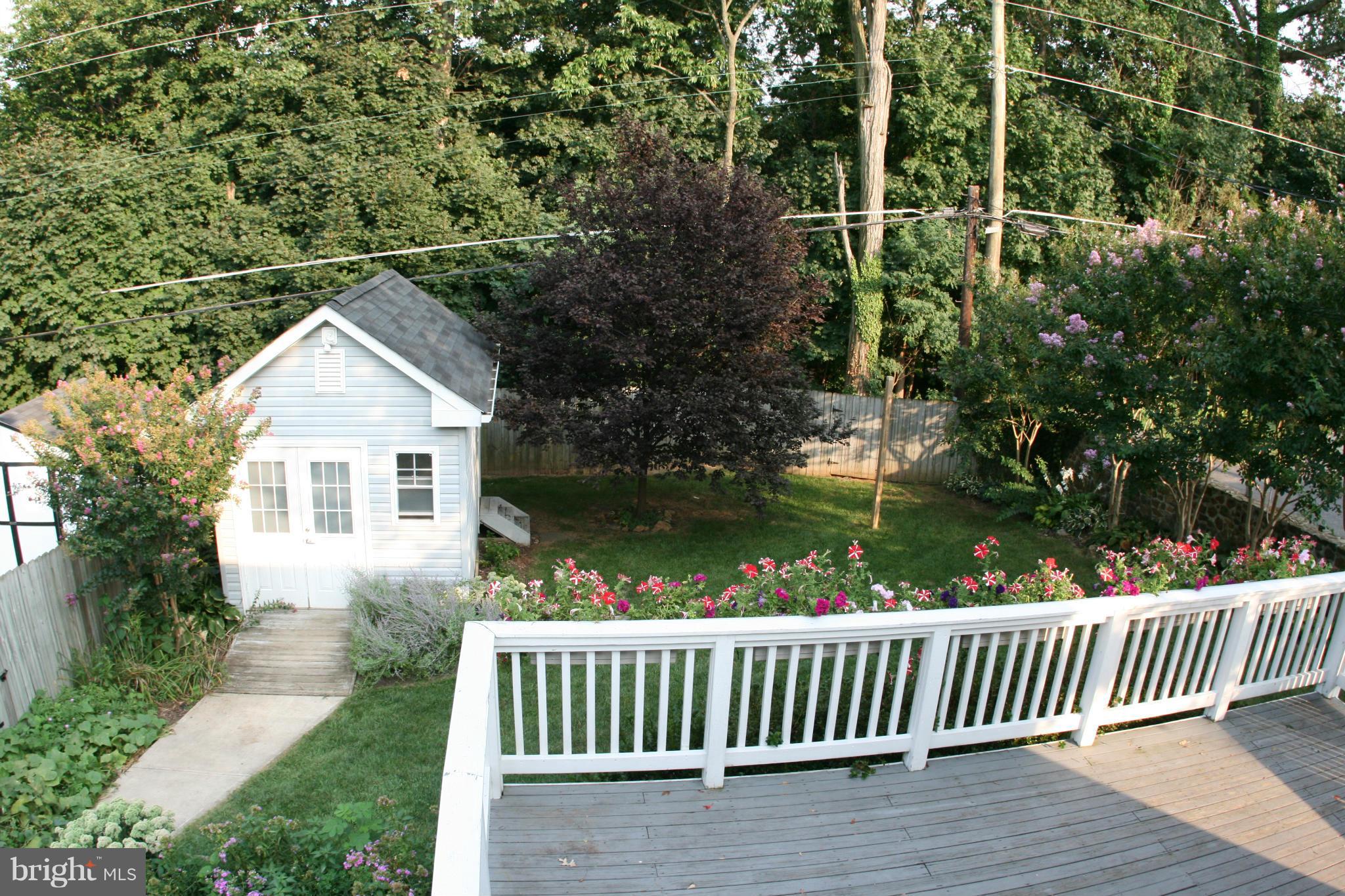 23 Edmondson Ridge Road Catonsville, MD 21228 - Photo 15 of 18 a front view of a house with garden